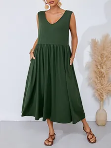 Detail of olive green sleeveless V-neck maxi dress with side pockets and gathered waist