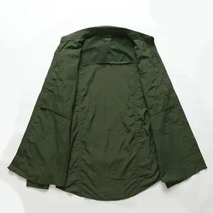 Detailed inside view of a dark green men's cargo shirt showing breathable mesh back panel