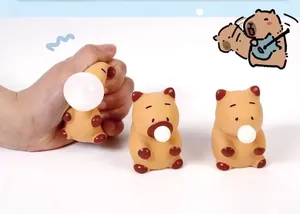 Detailed macro view of cute Capybara squeeze toy blowing bubbles for stress relief play
