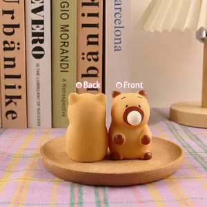 Close-up view showing the front and back of a cute capybara stress relief squishy toy