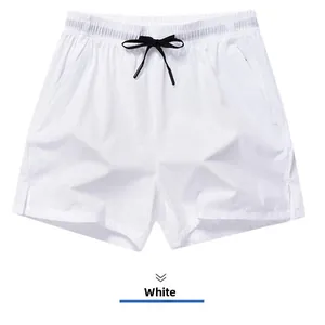 Detail view showing the clean design of men's white quick-dry ice silk sports shorts