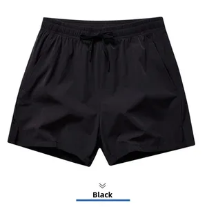 Front view of black quick-dry men's sports shorts with adjustable drawstring waist detail