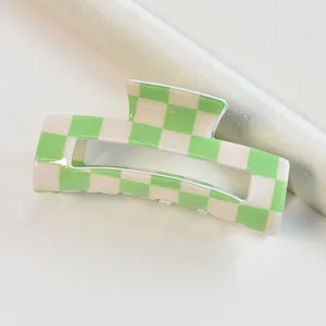Elegant green and cream checkerboard square hair claw clip for stylish spring hair styling