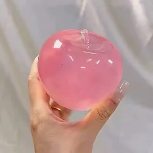 Giocattolo a pressione a forma di mela rosa traslucida per alleviare lo stress
