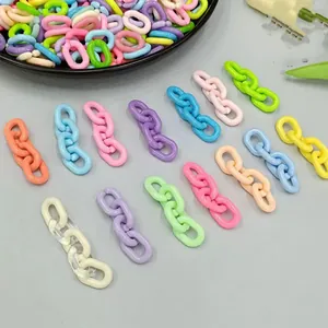 Close-up view of colorful candy-colored acrylic chain links for DIY bag and phone charms