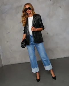 Stylish high-waisted straight-leg denim jeans featuring unique wide folded cuffs design.