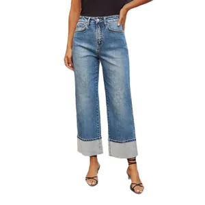 Fashionable high-waisted straight-leg blue denim jeans with wide cuffed hems for women