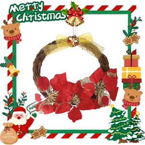 Close-up of Christmas wreath with red poinsettias, golden bow and festive bells on rattan