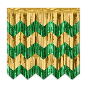 Macro detail of green and gold chevron pattern tinsel foil fringe curtain for party