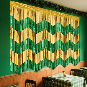 Green and gold chevron tinsel curtain backdrop for St. Patrick's Day party decoration