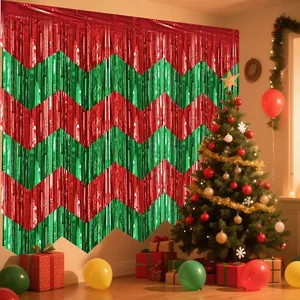 Festive Christmas party backdrop with red and green zigzag pattern tinsel foil fringe curtains