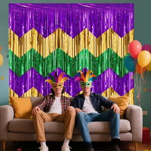 Mardi Gras party backdrop with purple gold green chevron pattern tinsel fringe curtain