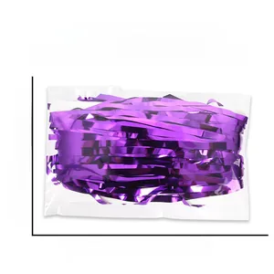 Detail view showing dimensions of purple foil fringe curtain in 15x27cm plastic packaging