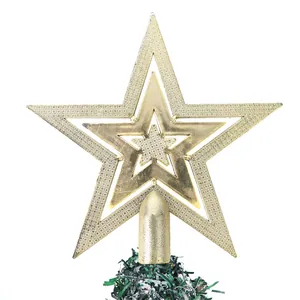 Detailed close-up of a multi-layered gold electroplated Christmas tree top star topper