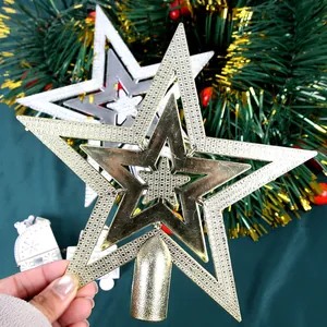 Detailed macro view of electroplated gold Christmas tree star topper texture