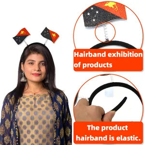 Detailed view of Papua New Guinea flag headband showing its elastic band and spring