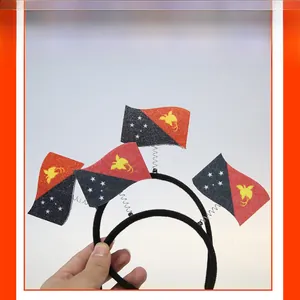 Close-up detail of Papua New Guinea flag headband accessory for festive party decorations
