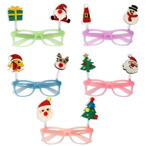 Set of luminous Christmas party glasses with festive Santa, reindeer and tree toppers