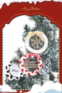 Detailed view of plush braided Christmas wreaths with snowflake and holiday message ornaments.