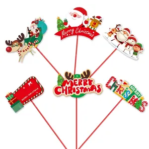 Cartoon Christmas paper signs featuring Santa and Reindeer props for party decor