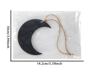 Black wooden crescent moon hanging ornament with size measurements 10x14.2cm detail
