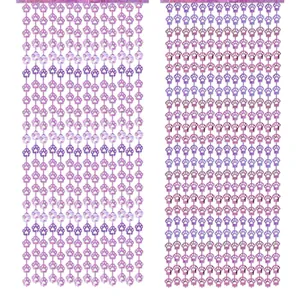 Pink and purple glitter paw print fringe curtains for pet themed birthday party decor