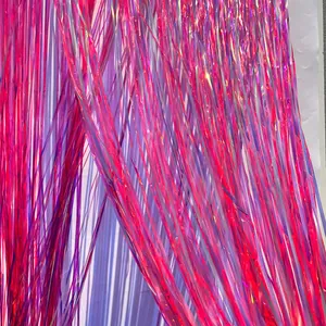 Vibrant 2M iridescent pink tinsel curtain backdrop for birthday and party decorations.