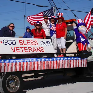 Patriotic red, white, and blue tinsel fringe garland for Independence Day parade floats.