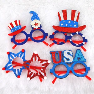 Set of four USA Independence Day novelty glasses with patriotic stars and hats.