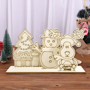 Close-up of unpainted wooden Christmas ornament featuring a snowman and reindeer