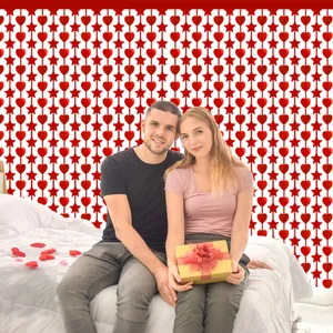 Red heart and star shaped foil fringe curtain for Valentine's Day party backdrop decor