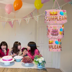 Pink three-tier birthday tassel hanging decoration for a festive children party scene