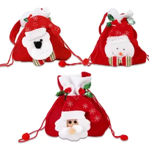 Set of 3 festive Christmas drawstring gift bags featuring Santa, Snowman, and Polar Bear motifs