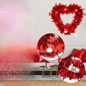 Close-up of Valentine's Day heart-shaped tinsel wreath with LED lights and gnomes