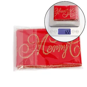 Red Christmas ribbon with gold Merry Christmas print and stitched edges, weight 12.2g
