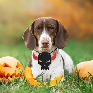Festive Halloween pet neck accessory featuring a black skull with red horns on a dog