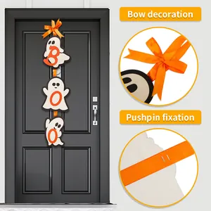 Halloween ghost door hanger details showing bow decoration and sturdy pushpin fixation