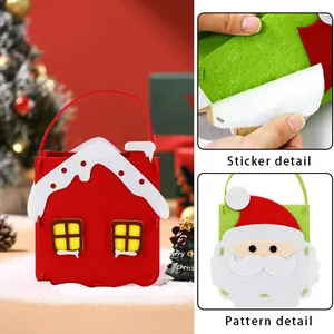 Sacs-cadeaux de Noël festifs en feutre avec motifs maison et Père Noël pour bonbons et cadeaux.