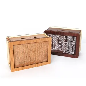 Two styles of wooden money boxes with savings goal counters on a clean white background