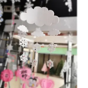 White foam cloud and snowflake hanging decorations for Christmas ceiling display