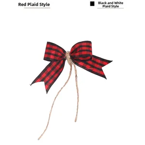 Detailed view of a red and black buffalo plaid Christmas bow with natural jute twine