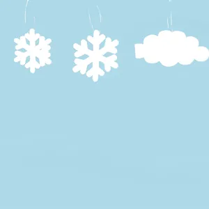 Detail of white foam snowflake and cloud hanging decorations for Christmas tree