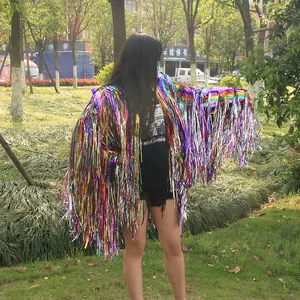 Rainbow tinsel fringe jacket for festivals and parties shown on a model outdoors.