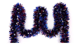 Close-up of patriotic red blue tinsel garland with silver star accents for party decoration