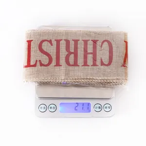 Detail view of 2 meter Christmas burlap decorative ribbon on a scale weighing 21.1 grams