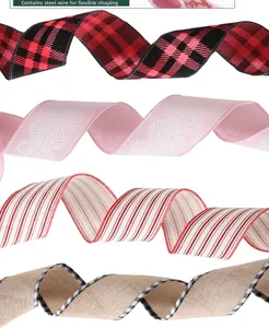 Detail of wire-edged Christmas ribbons with plaid, lace, and stripe patterns for DIY shaping.