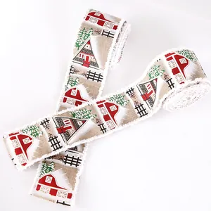 Rustic Christmas linen ribbon featuring cabin and barn print for holiday tree and gift decoration