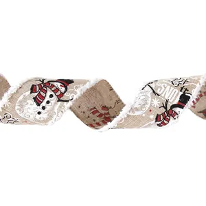 Burlap Christmas ribbon with snowman print and 'Let it snow' text for gift wrapping