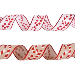 6.3cm wired Christmas ribbon featuring festive red candy cane patterns for gift wrapping