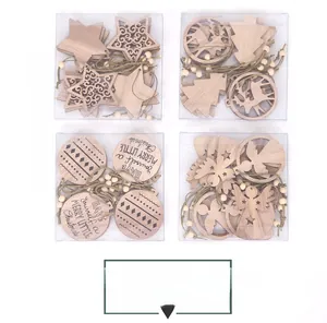 Juego de cuatro cajas de adornos navideños de madera con formas de estrella y ángel.